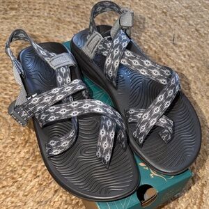 These are Chaco Nova ZVOLV 2 strappy sport sandals in gray